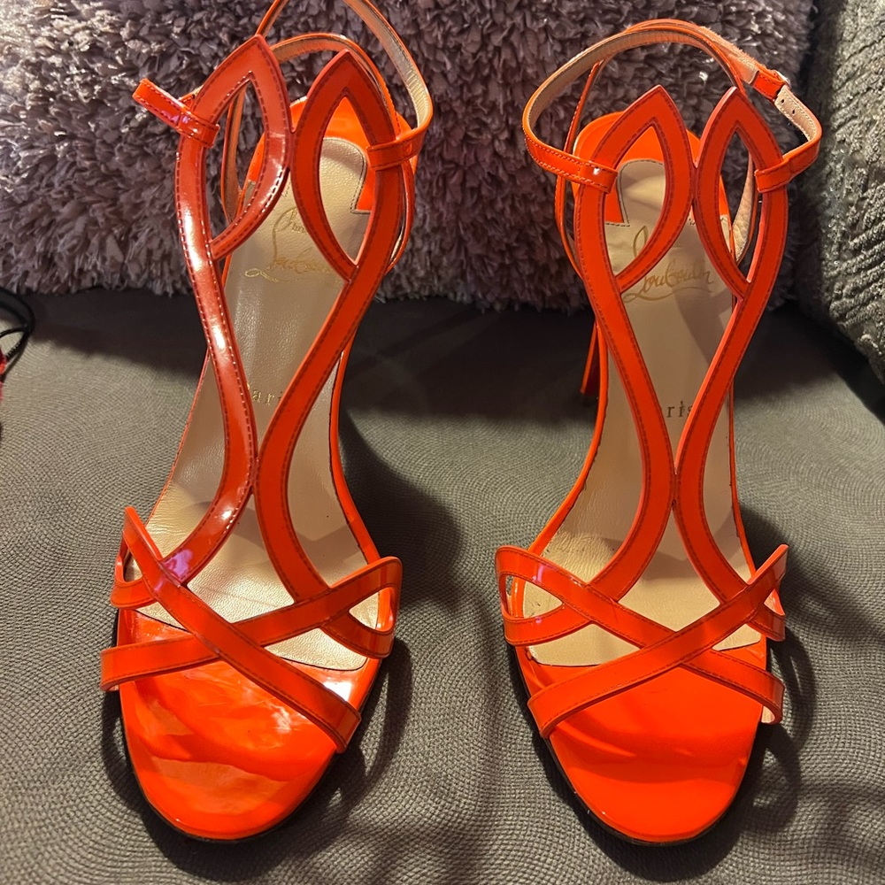 Neon orange double L Christian Louboutin
